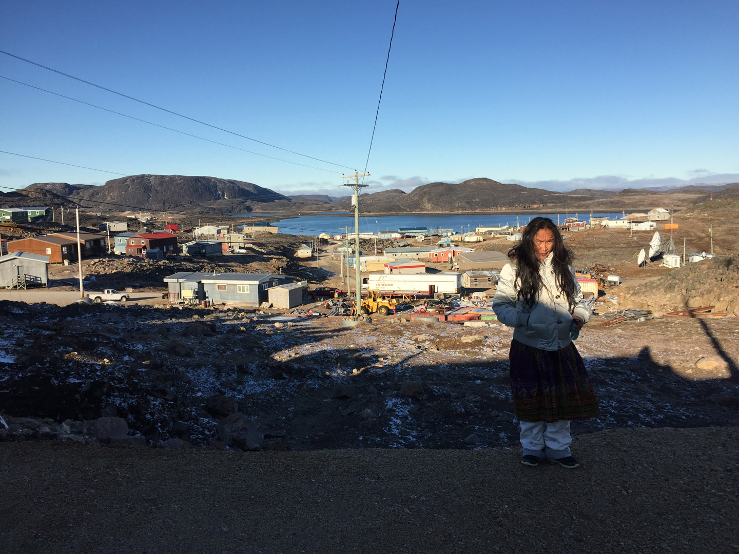 Shuvinai stands above the village of Cape Dorset, near the airport. October 5, '15. Photo by Shary
