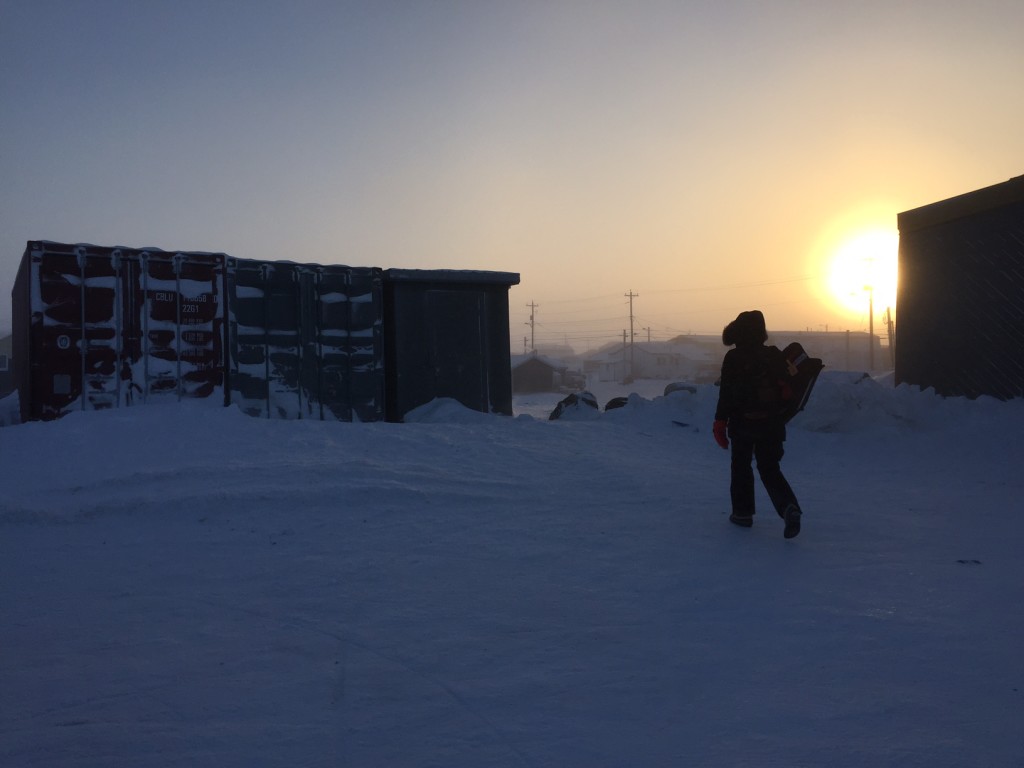 Marnie walking towards Matchbox Gallery in the  1pm sun.